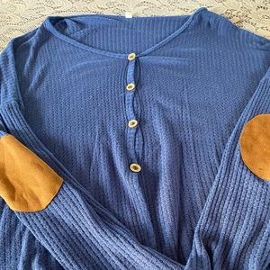Woman’s blue maternity cardigan
